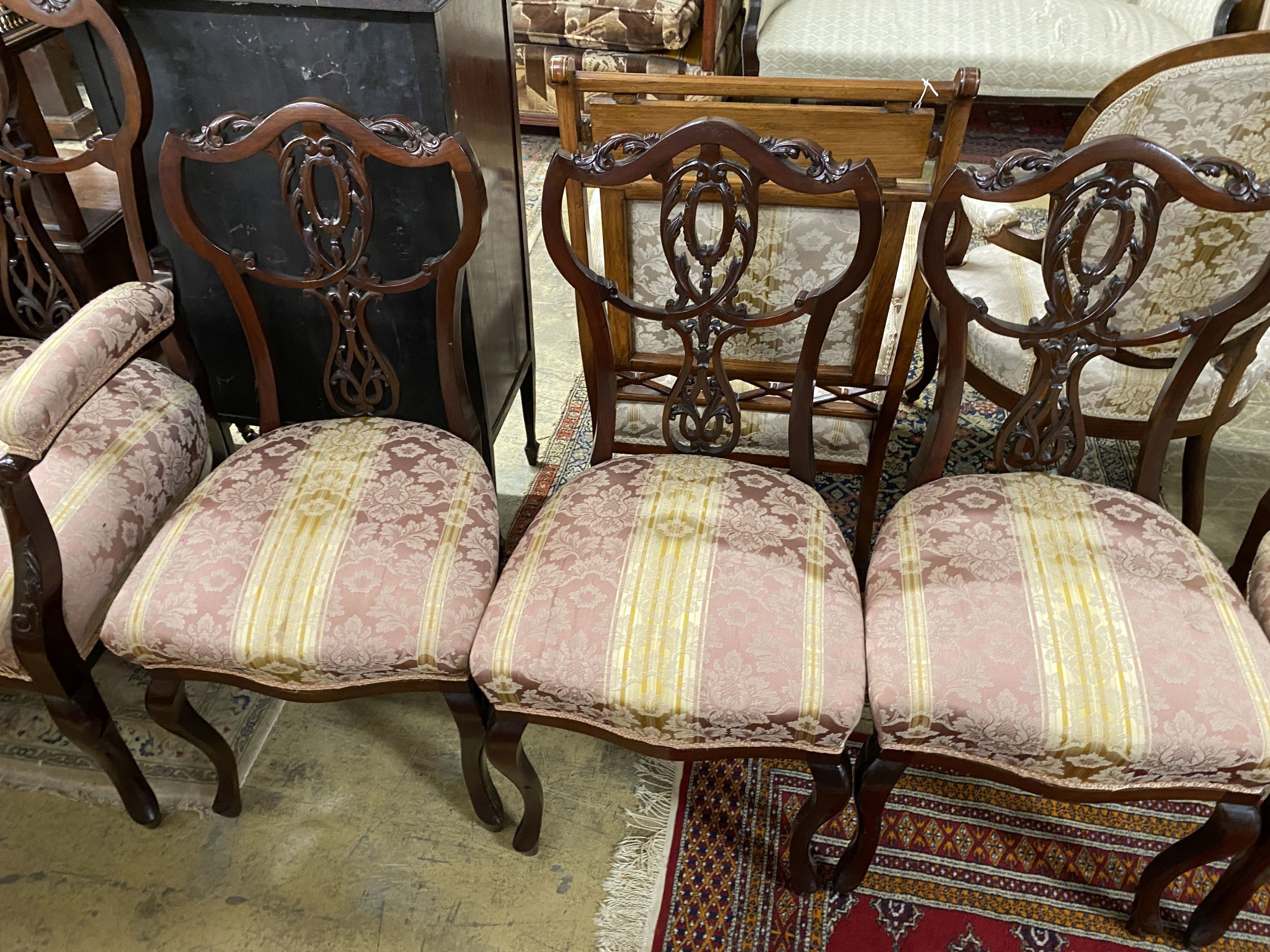 A late Victorian mahogany seven piece salon suite, settee length 120cm, depth 54cm, height 108cm